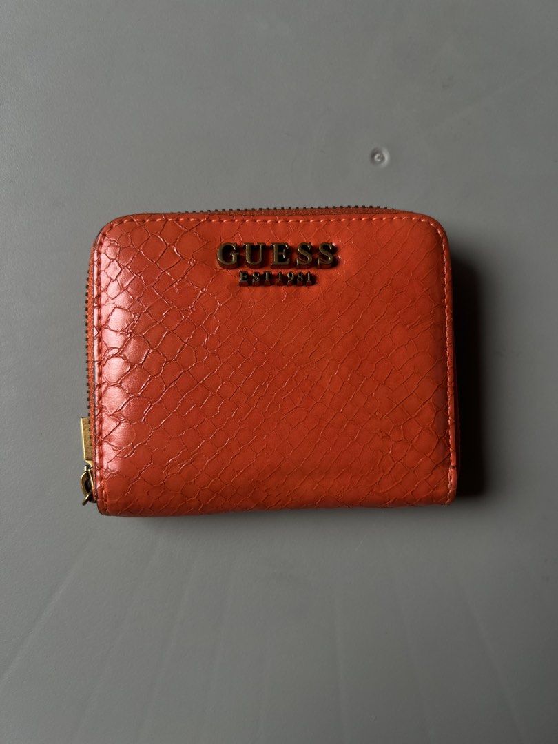 GUESS Laurel Croc-Embossed Small Zip-Around Wallet (Orange) (Category: Wallets & Card holders) located in Santa Rosa. Submitted by joselleferolino (Listing ID 1469961433, Image 1). Description: GUESS Laurel Croc-Embossed Small Zip-Around Wallet (Orange) Price: 750 (slightly negotiable) Selling this vibrant, authentic GUESS mini wallet. It is the perfect compact size for small bags or quick errands, and the color is an absolute head-turner! Produc