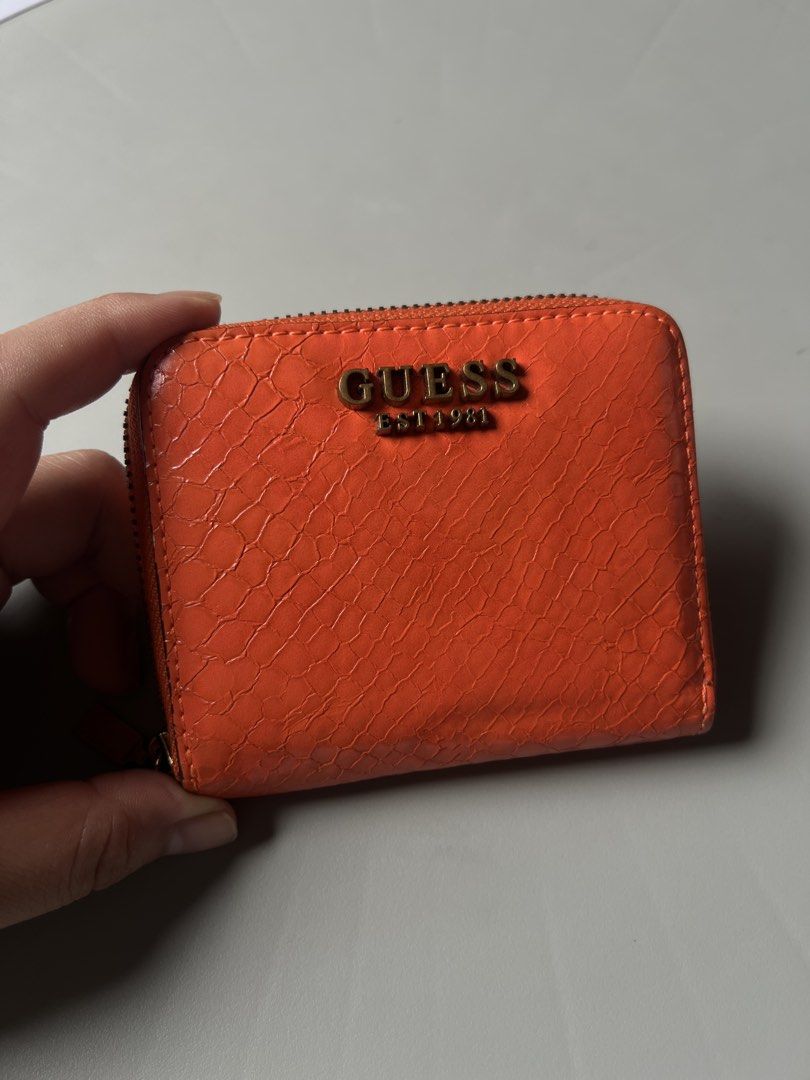GUESS Laurel Croc-Embossed Small Zip-Around Wallet (Orange) (Category: Wallets & Card holders) located in Santa Rosa. Submitted by joselleferolino (Listing ID 1469961433, Image 3). Description: GUESS Laurel Croc-Embossed Small Zip-Around Wallet (Orange) Price: 750 (slightly negotiable) Selling this vibrant, authentic GUESS mini wallet. It is the perfect compact size for small bags or quick errands, and the color is an absolute head-turner! Produc