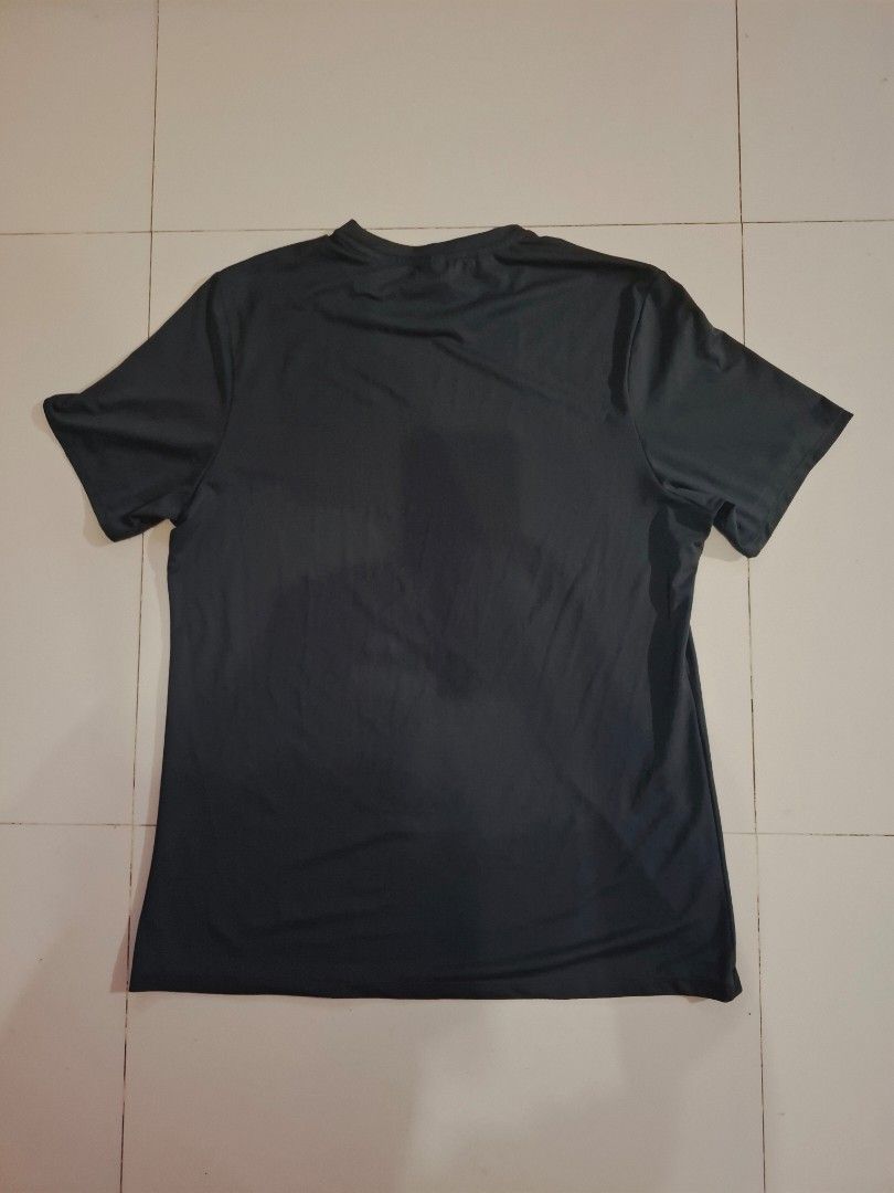 Gymshark drifit shirt (Category: Activewear) located in Narvacan. Submitted by jigger85_2ndaccount (Listing ID 1470083388, Image 3). Description: gymshark tshirt like new 9.7/10 condition no issue excellent condition dark gray color size: xl on tag dimes: 21 x 29 can fit to medium to large loc. ilocos sur.