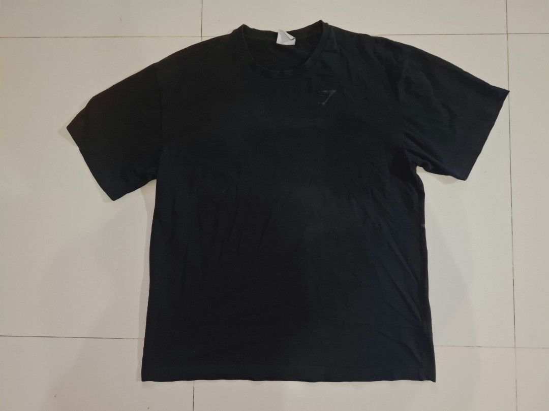 Gymshark shirt (Category: Activewear) located in Narvacan. Submitted by jigger85 (Listing ID 1470078837, Image 1). Description: gymshark shirt like new excellent condition 9.7/10 size: medium on tag dimes : 21 x 26 loc. ilocos sur.