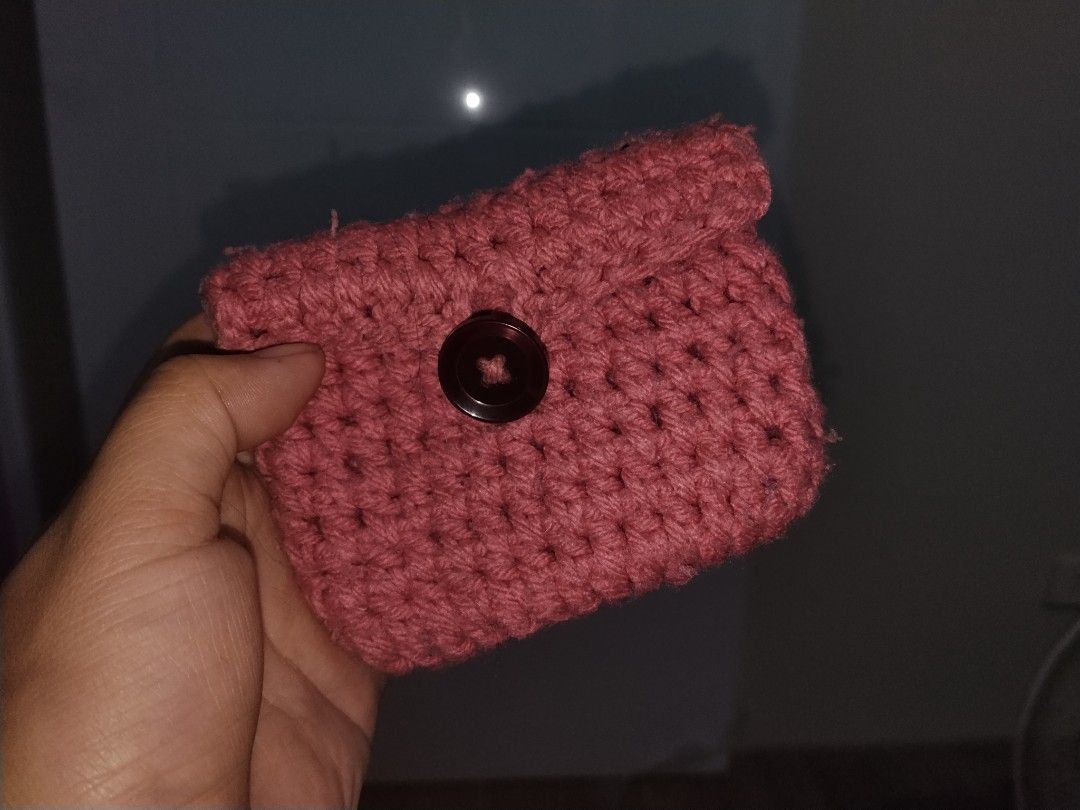 Handmade beaded and crocheted coin purses set (Category: Handmade Craft) located in Lapu Lapu. Submitted by cebudeclutterstuff (Listing ID 1470084870, Image 2). Description: - Set of 2 handmade mini pouches - Orange pouch: Translucent beaded mesh design with zipper closure - Pink pouch: Tightly crocheted yarn with front button flap - Palm-sized and lightweight - Perfect for organizing coins, cards, or small trinkets.