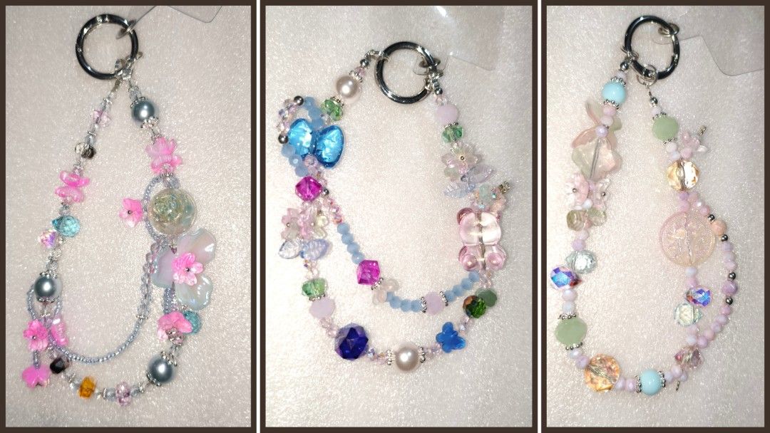 Handmade Beaded Phone Charm / Keychain Assortment (Category: Handmade Craft) located in Caloocan City. Submitted by books_and_beads (Listing ID 1470081483, Image 1). Description: - Handmade beaded charm with unique color combinations - Features cute flower, butterfly, and colorful bead accents: · Left Chain: A vibrant, maximalist ocean theme. It features bubblegum pink flower and butterfly charms alongside a large seafoam green glass disc, a brig