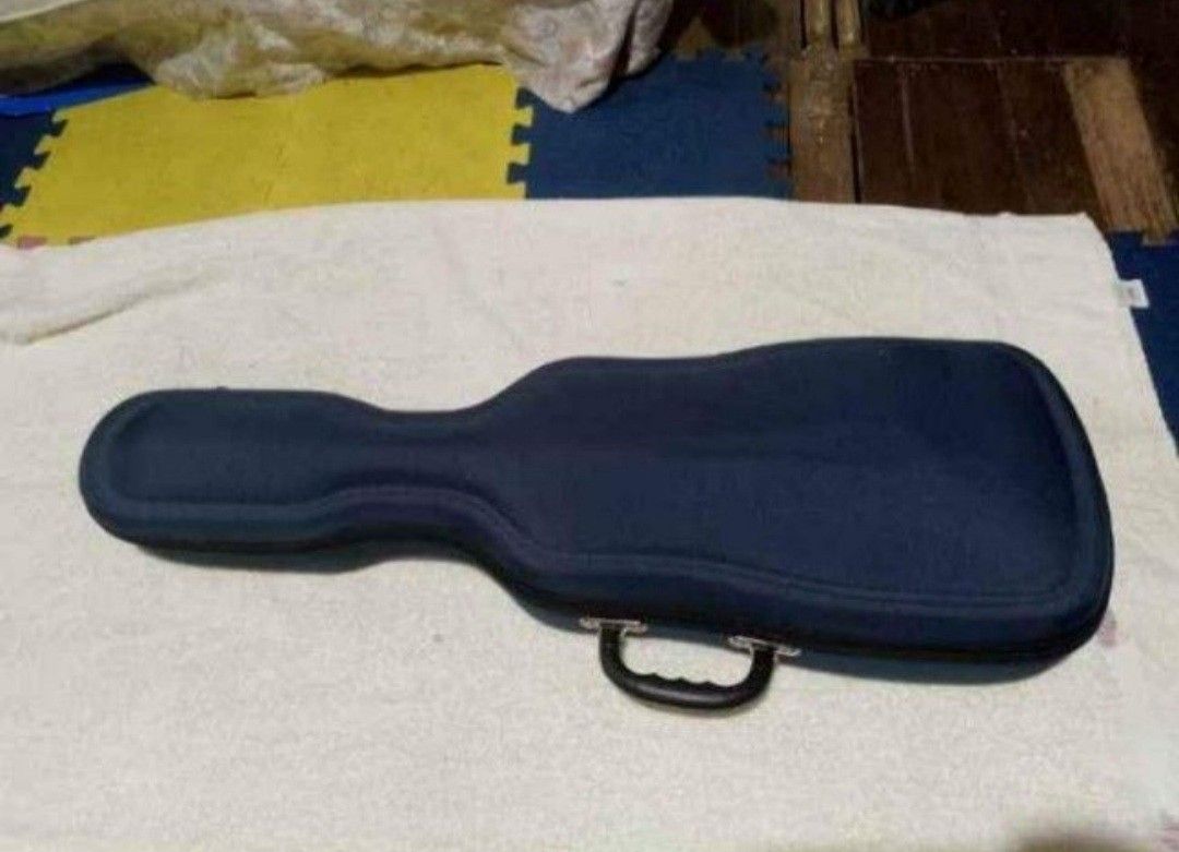Hard violin case dark blue velvet interior (Category: Musical Instruments) located in Manila. Submitted by mackimperi69173 (Listing ID 1470095833, Image 1). Description: - Type: Hard-shell violin case - Exterior: Stylish dark blue finish - Interior: Soft black plush velvet lining - Hardware: Secure latches and a sturdy carrying handle - Storage: Built-in compartments for accessories and a shoulder rest - Accessories: Carrying strap included insid