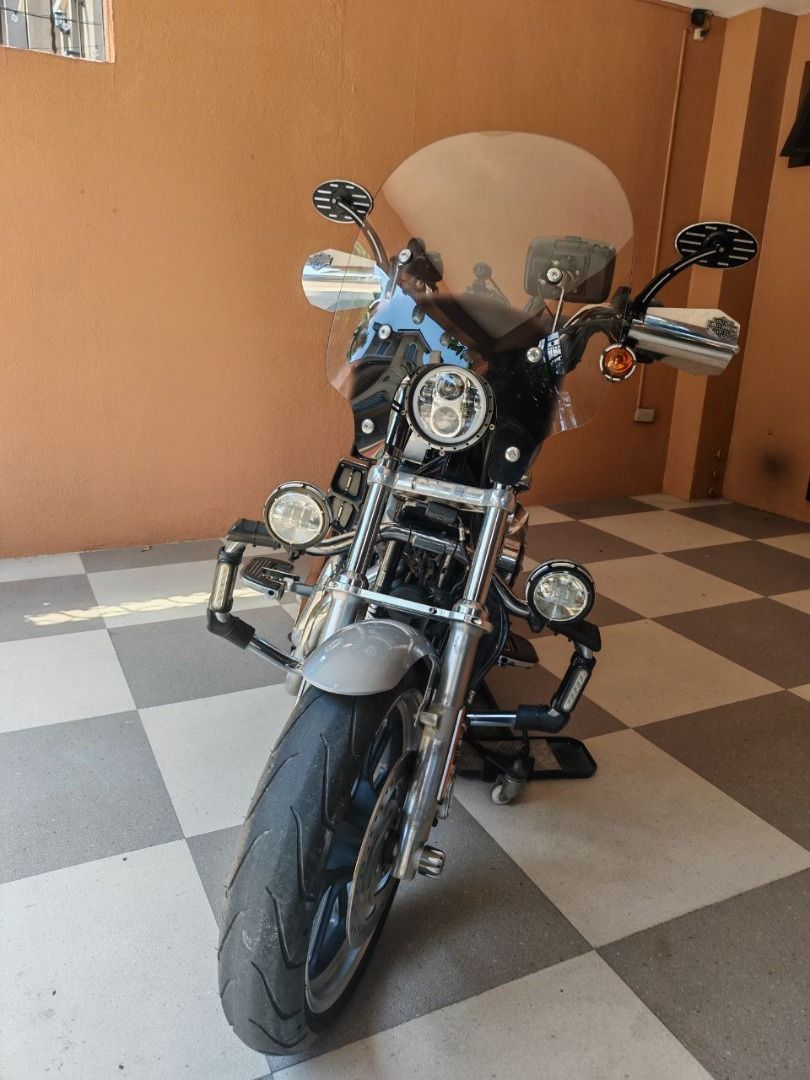 Harley Davidson Silver Motorcycle with Windshield and Custom Gauges (Category: Motorbikes for Sale) located in Manila. Submitted by rhilario2003 (Listing ID 1470072924, Image 3). Description: For sale as a complete package only no swap. Bike has been dressed up/styled to standout from a standard HD Superlow. Its a; - 2020 HD Sportster Superlow XL883L - 883cc engine, 5 speed manual transmission - Color Barracuda Silver - V-twin engine premium gaso
