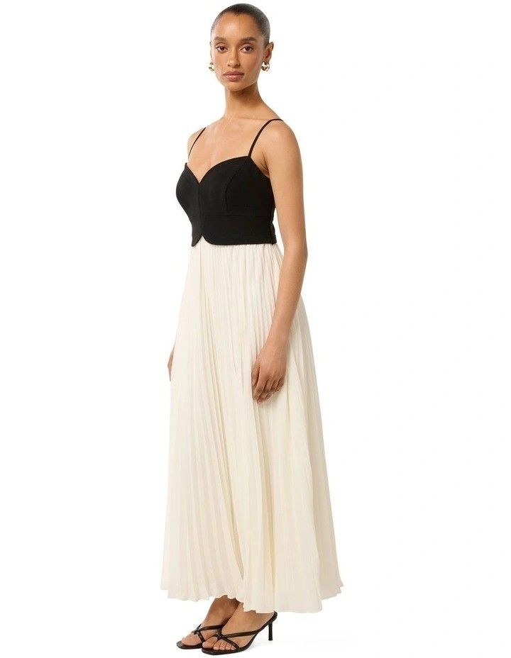 Hartford Pleated Midi Dress (Category: Dresses) located in Manila. Submitted by nootyoursss (Listing ID 1470056587, Image 3). Description: FOR RENT | Hartford Pleated Midi Dress – Black/White Make a statement with this elegant Hartford Pleated Midi Dress, featuring a structured black sweetheart bodice, delicate spaghetti straps, and a flowy white pleated skirt. Perfect for formal events, weddings, dinners, and special occasions. DRESS DETAILS • B