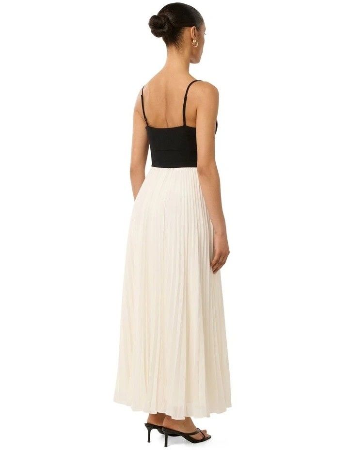 Hartford Pleated Midi Dress (Category: Dresses) located in Manila. Submitted by nootyoursss (Listing ID 1470056587, Image 2). Description: FOR RENT | Hartford Pleated Midi Dress – Black/White Make a statement with this elegant Hartford Pleated Midi Dress, featuring a structured black sweetheart bodice, delicate spaghetti straps, and a flowy white pleated skirt. Perfect for formal events, weddings, dinners, and special occasions. DRESS DETAILS • B
