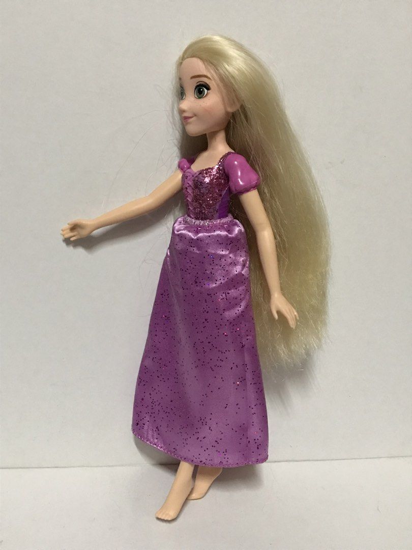 Hasbro Disney Princess Rapunzel Doll (Category: Kids Toys) located in Manila. Submitted by iyasellsph (Listing ID 1469992066, Image 3). Description: Hasbro Disney Princess Rapunzel Doll Approx 11 inches tall Conservatively classified as Lightly Used; Looks new, save for optional reglittering on front of bodice Molded top; satin skirt with micro crystals Very clean doll and skirt Clean, soft luxurious long blonde hair with layered ends Very tight 