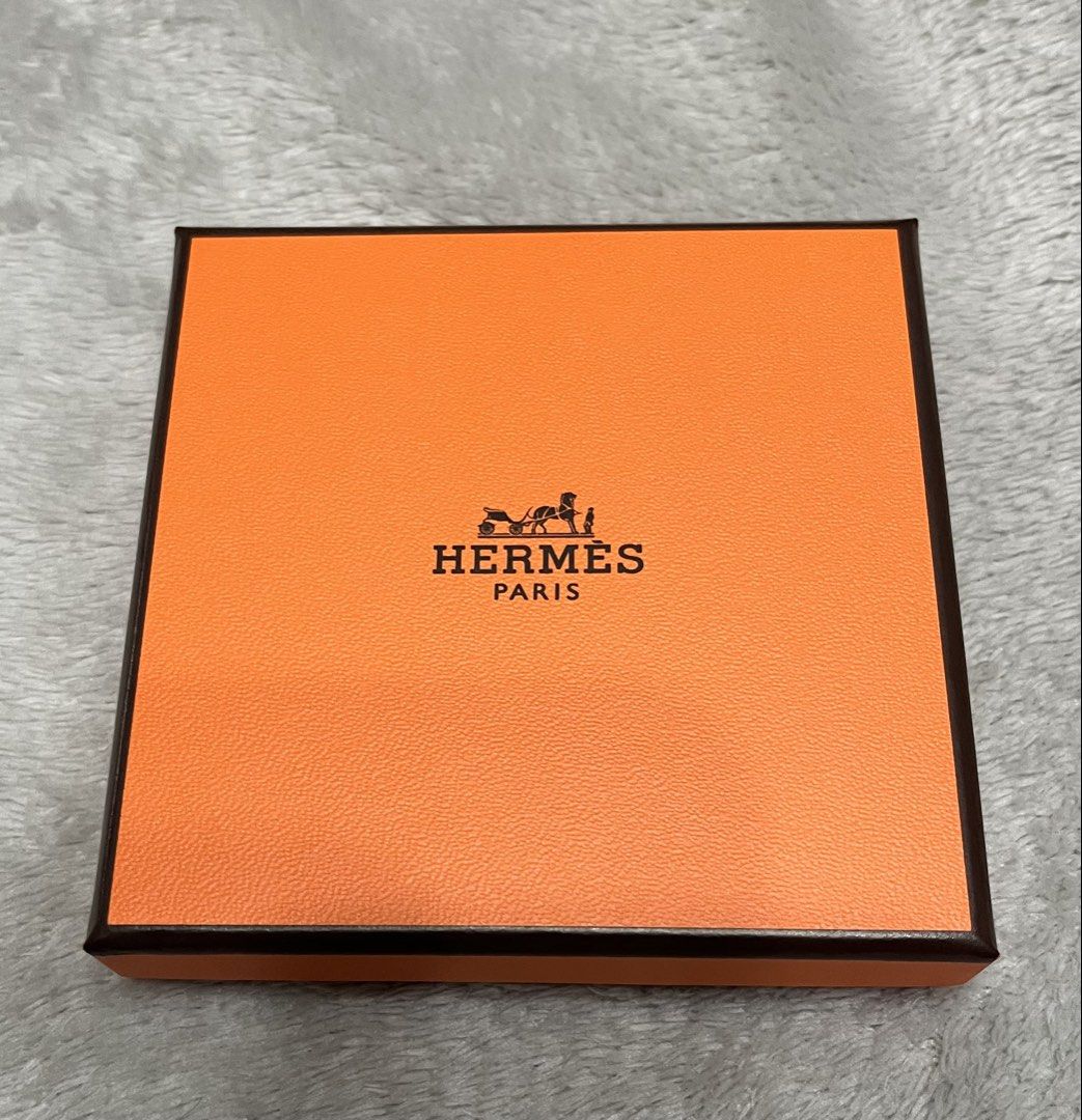 Hermes box small (Category: Luxury Accessories) located in Bacoor. Submitted by ayit. (Listing ID 1470017338, Image 2). Description: - Authentic Hermes small orange box with textured finish and black branding - Includes original product tag (Bracelet Tonnerre Simple Tour Veau Swift) and Japanese care card - Excellent pre-owned condition, clean interior and exterior - Ideal for luxury item storage, gift presentation, or completing a set - Meetup l