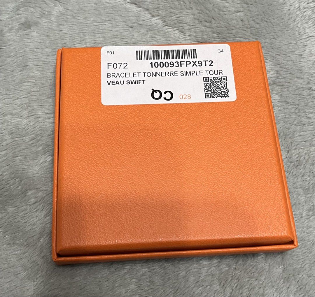 Hermes box small (Category: Luxury Accessories) located in Bacoor. Submitted by ayit. (Listing ID 1470017338, Image 3). Description: - Authentic Hermes small orange box with textured finish and black branding - Includes original product tag (Bracelet Tonnerre Simple Tour Veau Swift) and Japanese care card - Excellent pre-owned condition, clean interior and exterior - Ideal for luxury item storage, gift presentation, or completing a set - Meetup l