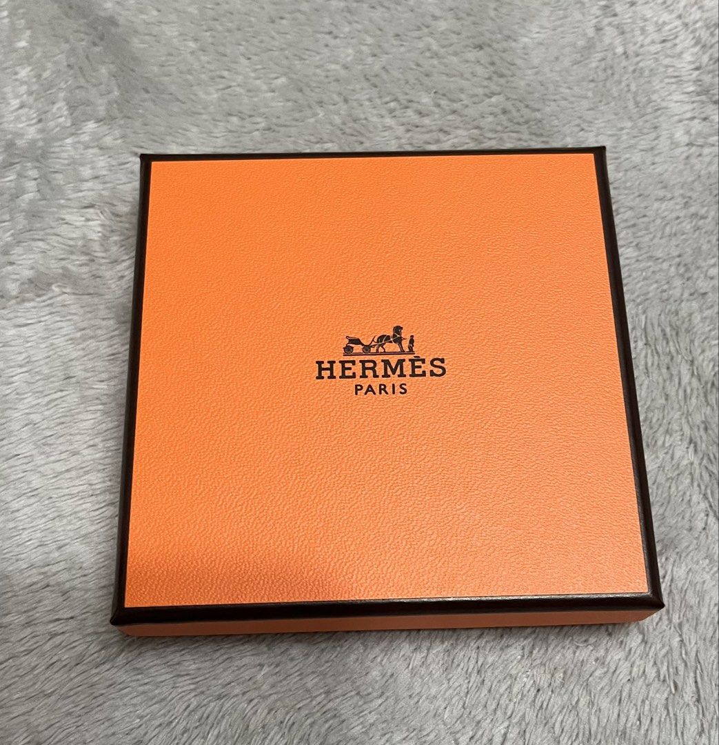 Hermes box small (Category: Luxury Accessories) located in Bacoor. Submitted by ayit. (Listing ID 1470017338, Image 1). Description: - Authentic Hermes small orange box with textured finish and black branding - Includes original product tag (Bracelet Tonnerre Simple Tour Veau Swift) and Japanese care card - Excellent pre-owned condition, clean interior and exterior - Ideal for luxury item storage, gift presentation, or completing a set - Meetup l