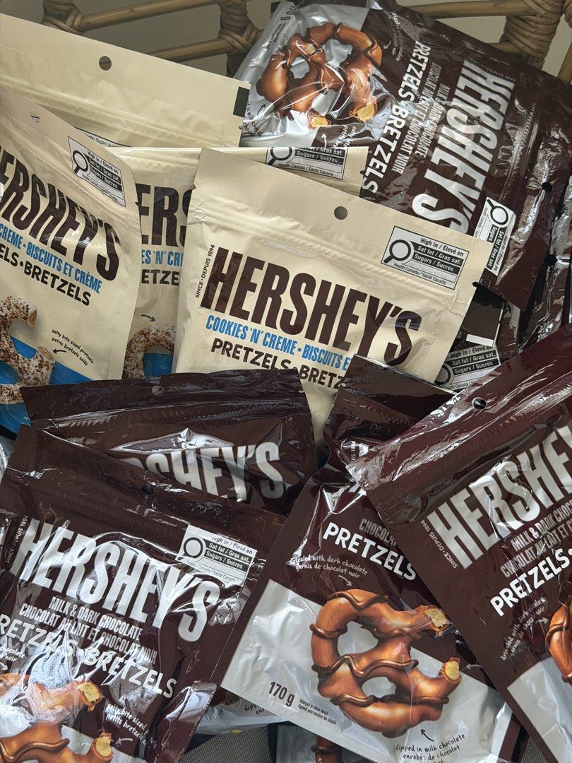 Hershey's Pretzels (Category: Packaged & Instant Food) located in Quezon City. Submitted by ramosieee (Listing ID 1469970266, Image 2). Description: Fresh from Canada 🇨🇦 Brand new, unopened Hershey's pretzel bundle - Includes 170g resealable bags of Milk Chocolate, Dark Chocolate, and Cookies 'N' Creme Pretzels - Perfect balance of sweet and salty flavors - Resealable pouch design keeps snacks fresh longer - Multiple bags available in this bund