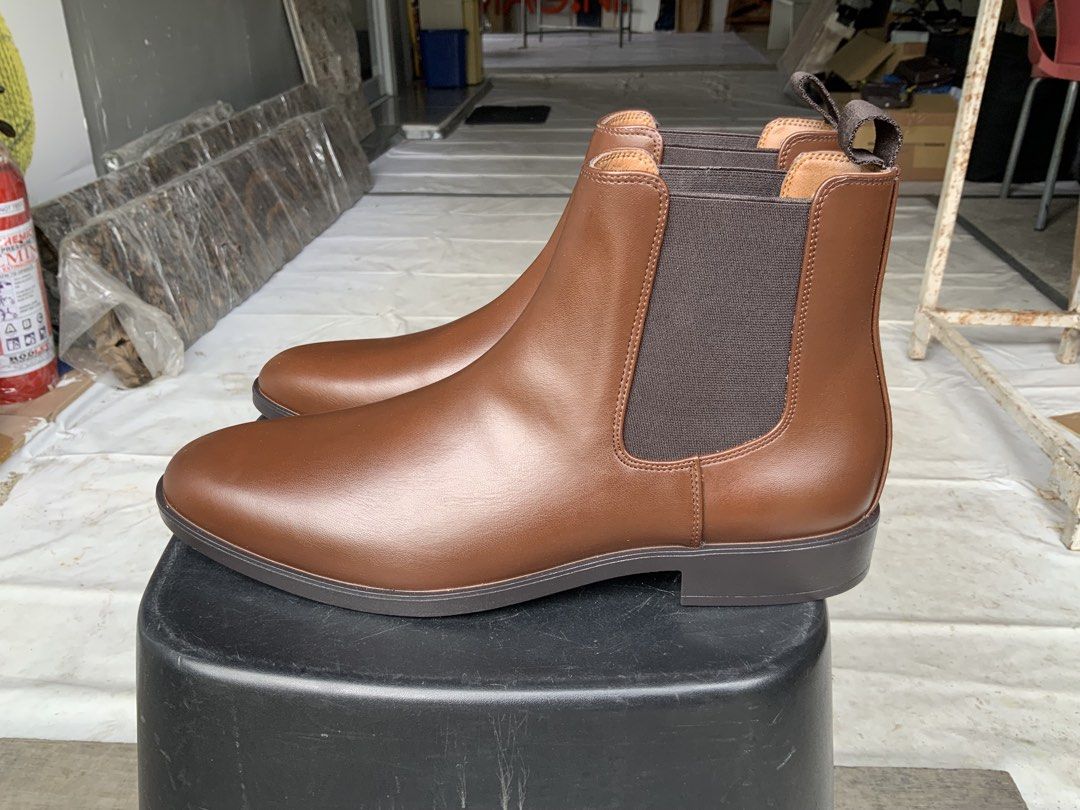 H&M Brown Chelsea Boots (Category: Boots) located in Makati City. Submitted by imagineinc. (Listing ID 1469995973, Image 2). Description: - Brown Chelsea boots - Size US 11.5 - Purchased online, wrong size, too big - Brand new, never worn, pristine condition - Features Elastic side gussets and heel pull tabs for easy slip-on - Clean, smooth finish across the toes.