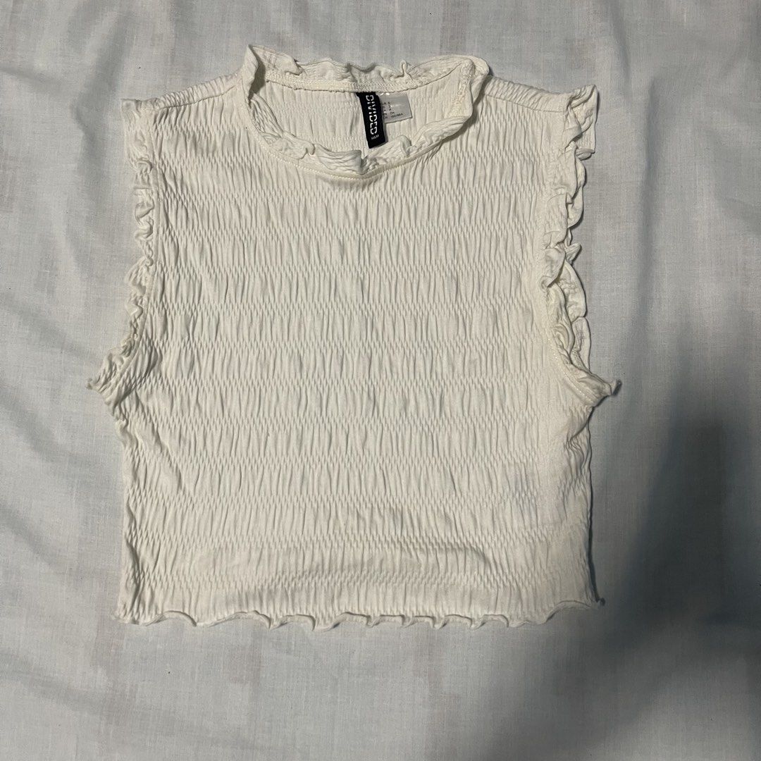 H&M Divided White Smocked Ruffle Crop Top Size S (Category: Sleeveless) located in San Ildefonso. Submitted by rgdeclutters (Listing ID 1470002087, Image 3). Description: L - 15" W - 13".