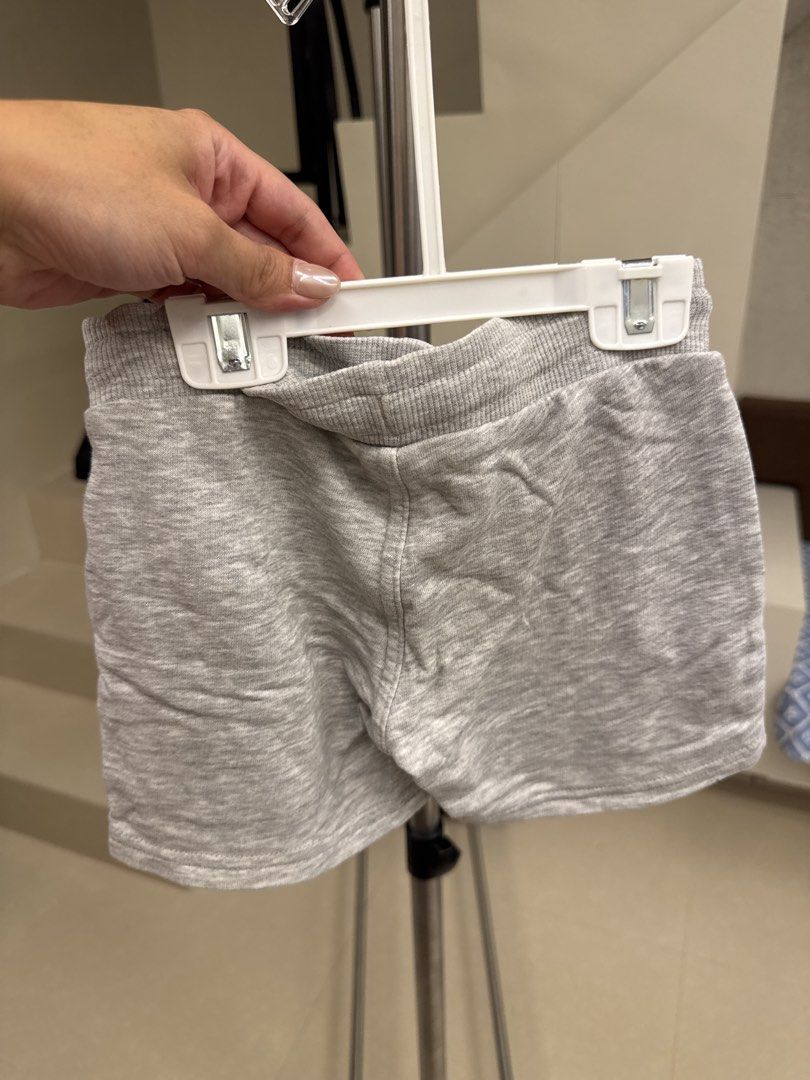 H&M Grey Basic Shorts 2-3Y (98) (Category: Babies & Kids Fashion) located in Manila. Submitted by __nix (Listing ID 1470017077, Image 2). Description: - Brand: H&M - Color: Neutral grey (easy to match with any top) - Size: EUR 98 (fits toddlers 2-3 years old) - Material: Soft cotton for all-day comfort - Features: Elastic waistband with adjustable drawstring - Condition/Use: Perfect for daily wear, lounging, or playtime.