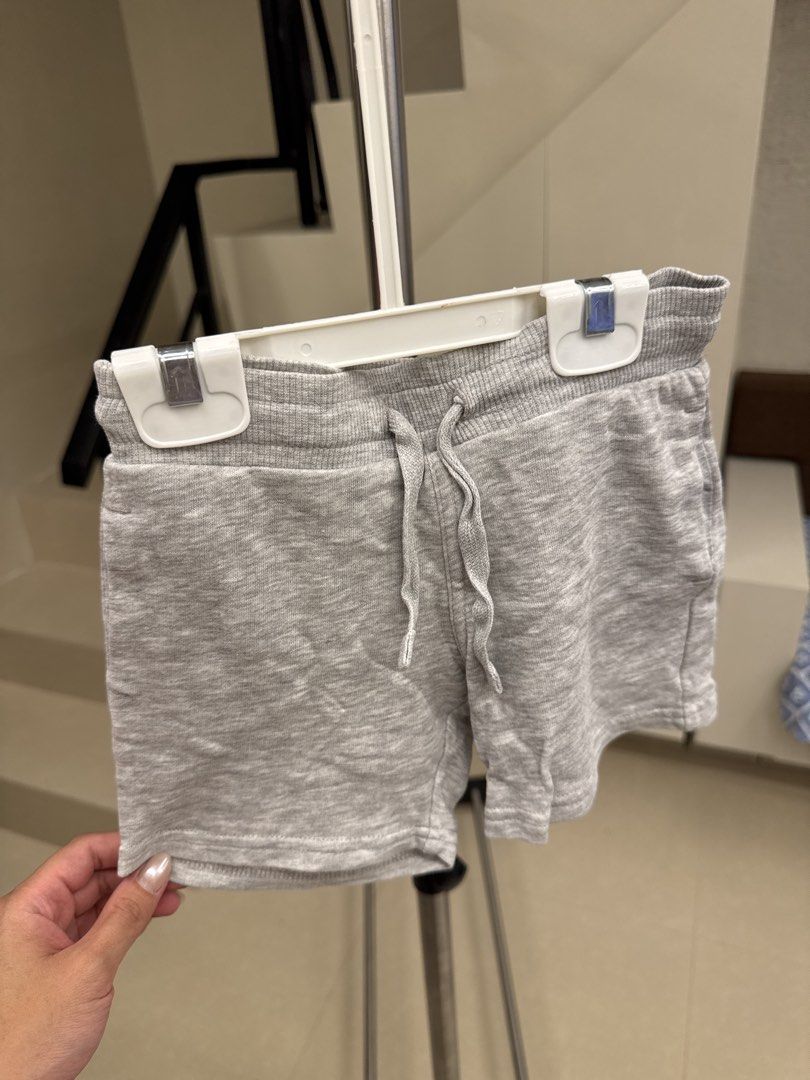 H&M Grey Basic Shorts 2-3Y (98) (Category: Babies & Kids Fashion) located in Manila. Submitted by __nix (Listing ID 1470017077, Image 1). Description: - Brand: H&M - Color: Neutral grey (easy to match with any top) - Size: EUR 98 (fits toddlers 2-3 years old) - Material: Soft cotton for all-day comfort - Features: Elastic waistband with adjustable drawstring - Condition/Use: Perfect for daily wear, lounging, or playtime.