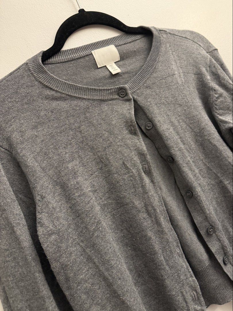 H&M Grey Cardigan Loose Fit Small (Category: Coats, Jackets and Outerwear) located in Manila. Submitted by closetclearout.mnl (Listing ID 1470085526, Image 2). Description: Can fit a medium - best fit Small .