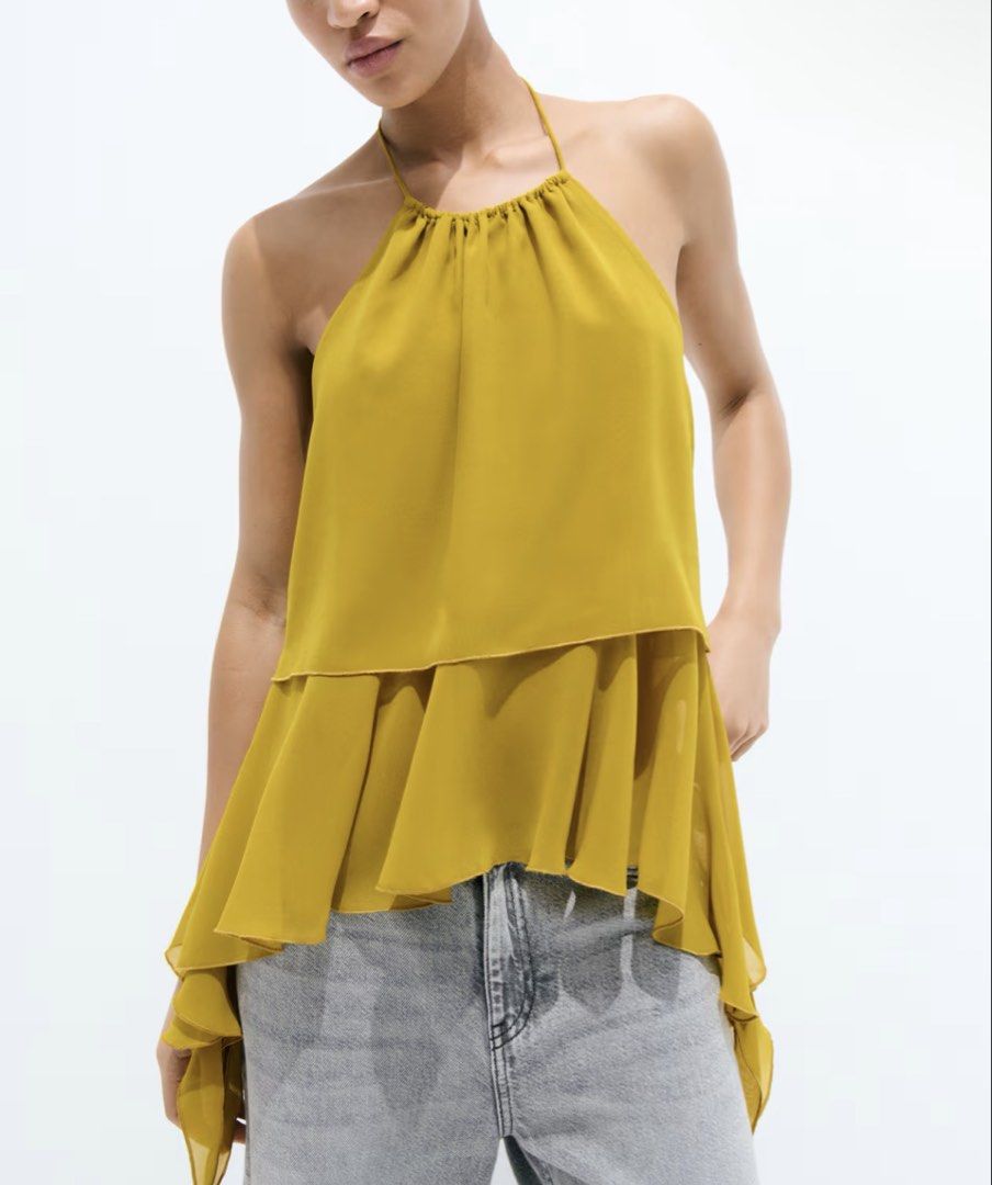 H&M Halter Neck Layered Ruffle Top in XXS (Category: Sleeveless) located in Bacolod City. Submitted by myyarchives_____ (Listing ID 1470128126, Image 3). Description: I’m usually size XS but in this style, XXS fit me better hehe OG price: Php 800.