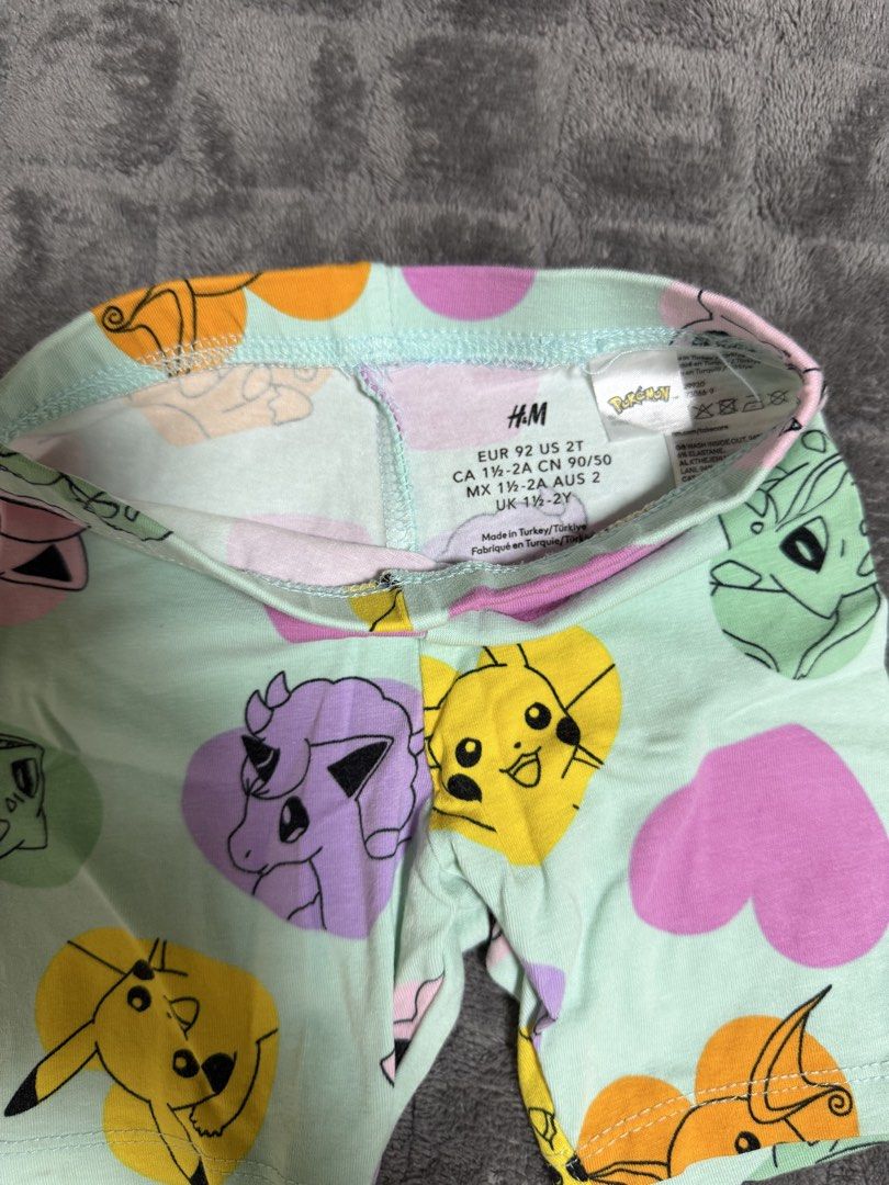 H&M Pokémon Baby Shorts Size 2T (Category: Babies & Kids Fashion) located in Cabuyao City. Submitted by shea.elise (Listing ID 1470118340, Image 1). Description: - Brand: H&M - Item 1: Mint green Pokémon characters & hearts print shorts (EUR 92, US 2T) - Item 2: White and green striped shorts (EUR 80, US 12M) - Material: Soft and comfortable cotton blend - Features: Elastic waistband for easy dressing - Condition: Great for everyday wear - Bundle