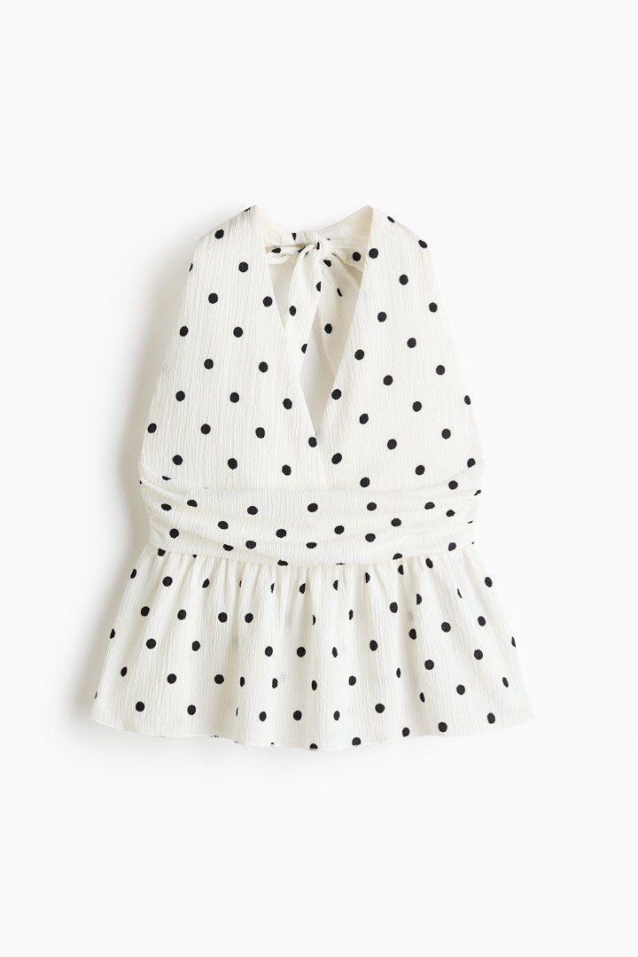 HM Polka dot halter neck peplum top (Category: Sleeveless) located in Taguig. Submitted by httpgrant (Listing ID 1469955283, Image 2). Description: - Color & Pattern: Yellow with black polka dots - Design: Halter neck with matching back bow tie and textured peplum hem - Fabric: Super breezy, lightweight, and comfortable for warm weather - Available in white & yellow - Worn twice both! super nice - Srp 999 each bought from hm sm aura.