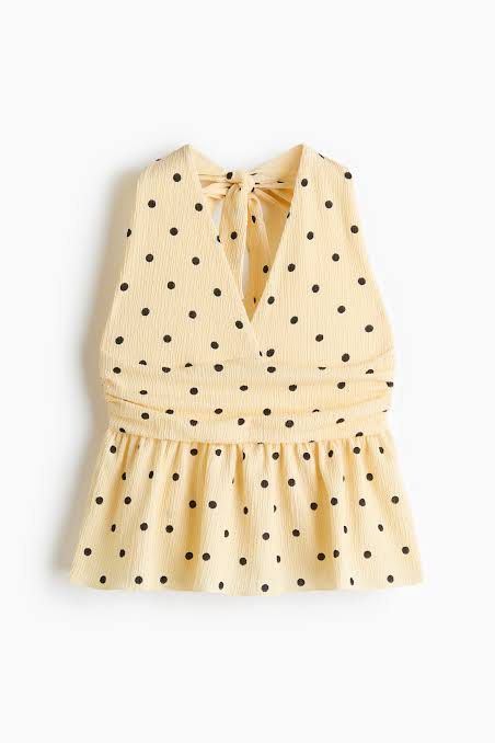HM Polka dot halter neck peplum top (Category: Sleeveless) located in Taguig. Submitted by httpgrant (Listing ID 1469955283, Image 1). Description: - Color & Pattern: Yellow with black polka dots - Design: Halter neck with matching back bow tie and textured peplum hem - Fabric: Super breezy, lightweight, and comfortable for warm weather - Available in white & yellow - Worn twice both! super nice - Srp 999 each bought from hm sm aura.