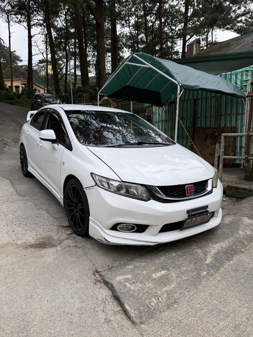 Honda Civic 1.8 (A) (Category: Used Cars) located in Quezon City. Submitted by dapanaaaay (Listing ID 1469972553, Image 1). Description: honda civic fb 2013 automatic trans smooth shifting no delay intact interior good condition no major issue led headlights and foglights oem red glass type badge original modulo body kits (chin, side skirts, diffuser) original mugen spoiler lmtless full exhaust chambered muffler complete papers naka retune origin
