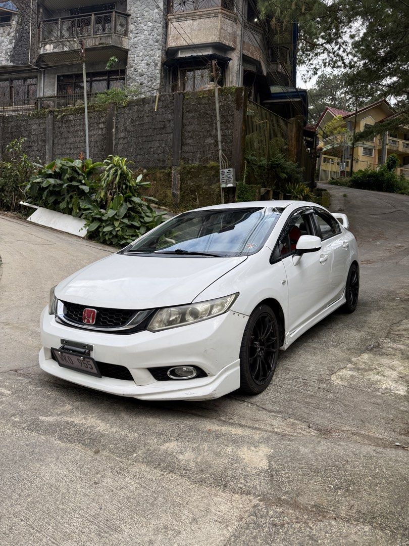 Honda Civic 1.8 (A) (Category: Used Cars) located in Quezon City. Submitted by dapanaaaay (Listing ID 1469972553, Image 2). Description: honda civic fb 2013 automatic trans smooth shifting no delay intact interior good condition no major issue led headlights and foglights oem red glass type badge original modulo body kits (chin, side skirts, diffuser) original mugen spoiler lmtless full exhaust chambered muffler complete papers naka retune origin