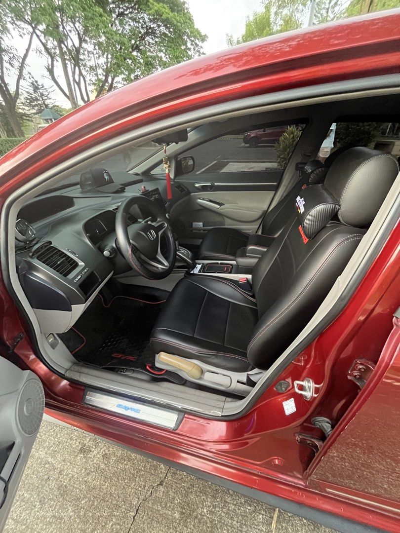 Honda Civic 1.8 VTI-S (A) (Category: Used Cars) located in Rizal. Submitted by kurtleyva (Listing ID 1469986080, Image 3). Description: 2010 Honda Civic FD 1.8 AT – Original Habanero Red 💰 Asking Price: ₱459,888 (Negotiable) Sporty-looking Honda Civic FD with an eye-catching original Habanero Red paint and upgraded setup. Features & Upgrades: * Automatic transmission with paddle shifters * 27,000 km mileage * Mugen RR-inspired body kit * TE37 ma