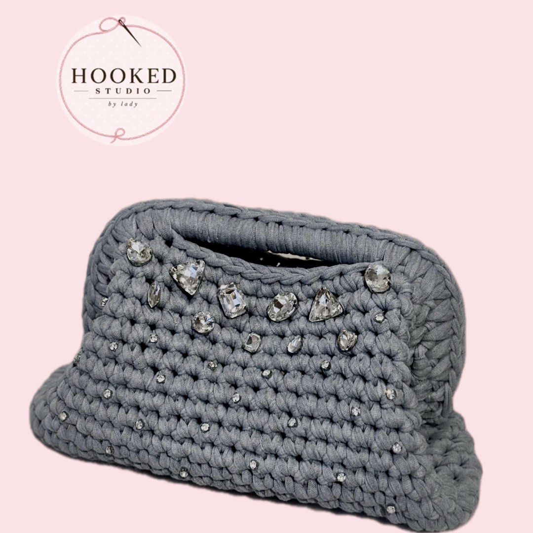 Hooked Studio Rhinestone Clutch (Category: Clutches) located in Taguig. Submitted by hookedstudio.duma (Listing ID 1470128122, Image 1). Description: - Brand: Hooked Studio (Handmade) - Design: Decorated with rhinestones on the front - Capacity: 30cm Compact size, fits small daily essentials easily. Not too small not too big. - Styling: Versatile for both casual outfits and evening wear .