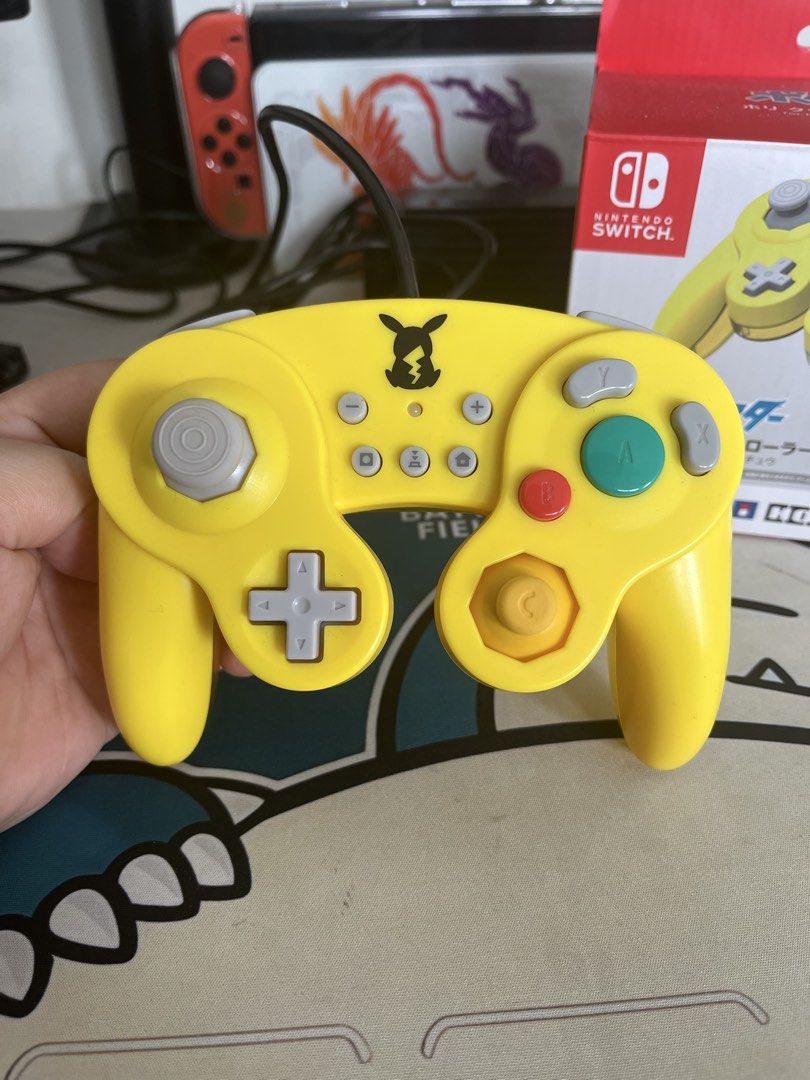 HORI Pokémon Pikachu Classic Controller for Nintendo Switch (Category: Controllers) located in Mandaluyong City. Submitted by ronohuntschase (Listing ID 1469951944, Image 1). Description: - Official HORI Pikachu Yellow design for Nintendo Switch - Iconic Gamecube-style layout - 100% working condition - Includes original retail box - Only Used twice .