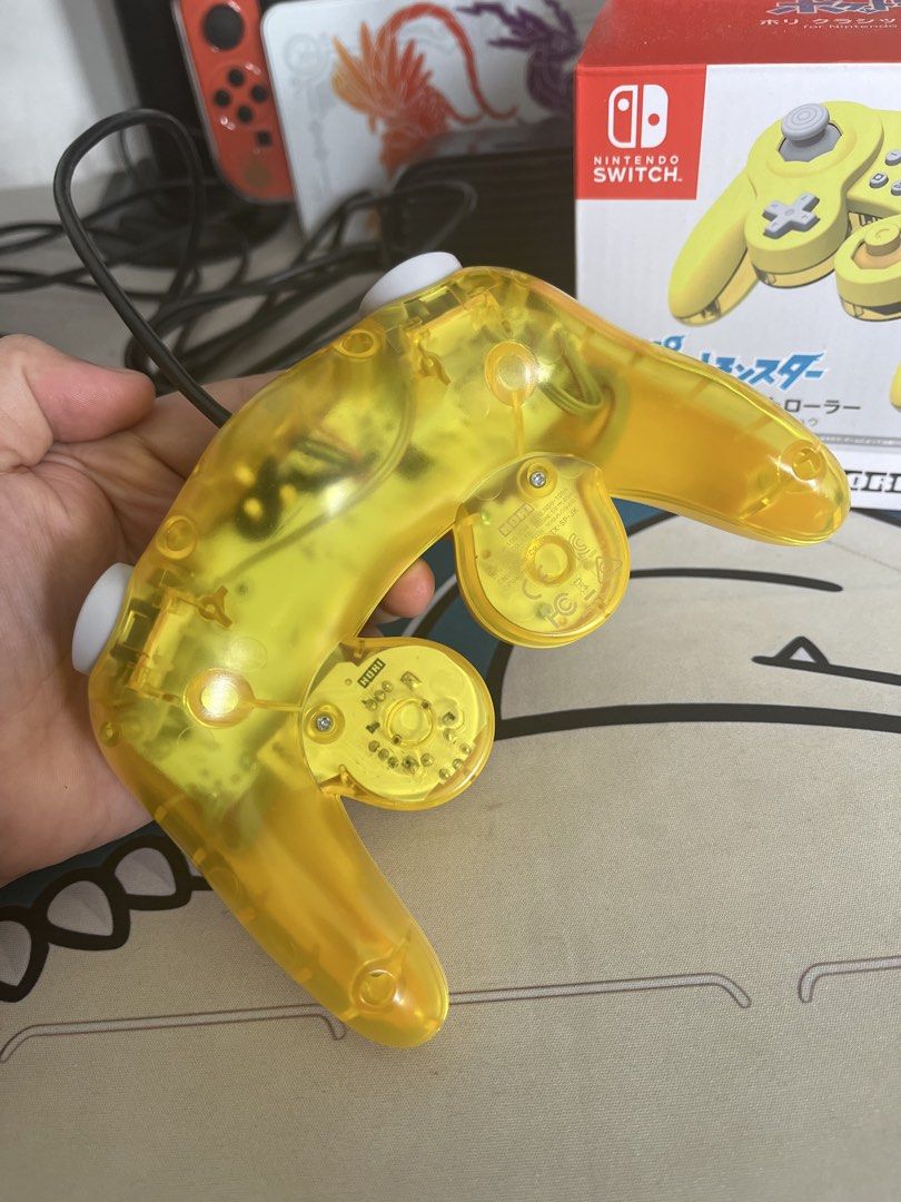 HORI Pokémon Pikachu Classic Controller for Nintendo Switch (Category: Controllers) located in Mandaluyong City. Submitted by ronohuntschase (Listing ID 1469951944, Image 2). Description: - Official HORI Pikachu Yellow design for Nintendo Switch - Iconic Gamecube-style layout - 100% working condition - Includes original retail box - Only Used twice .