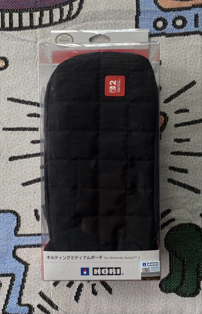 HORI Puff Pouch Bag (Category: Nintendo) located in Manila. Submitted by zenfalcon_23f0a9 (Listing ID 1469988140, Image 1). Description: HORI Puff Pouch Bag (Nintendo Switch 2) Price: ₱ 500 Original HORI Pouch Black Quilted Design Officially Licensed by Nintendo With Original Packaging Good Condition Ready to Use Lalamove Available (Shipping Fee Shouldered by Buyer) 📍 Manila 📩 PM for Faster Transaction.