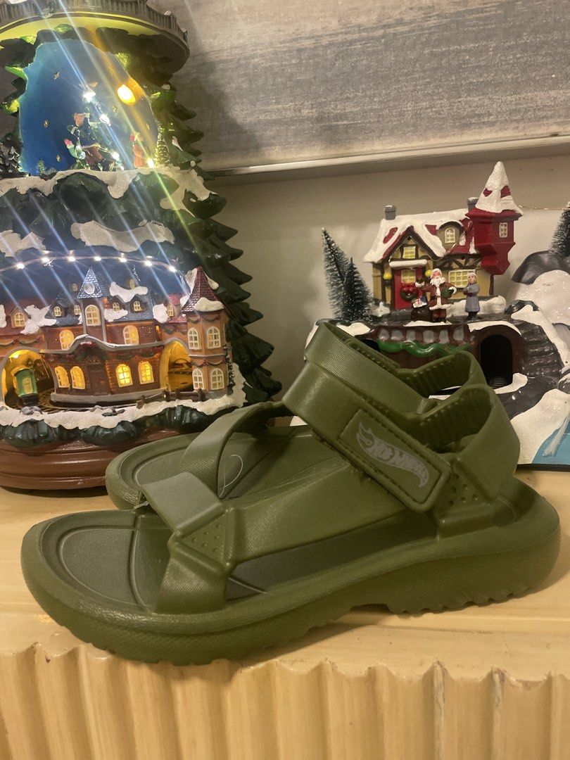 Hot Wheels Green Sandals (Category: Babies & Kids Fashion) located in Mandaluyong City. Submitted by cleanmycloset8 (Listing ID 1470068334, Image 1). Description: - Color: Green with Hot Wheels logo on the side - Closure: Easy slip-on style with adjustable velcro straps - Material: Lightweight rubber - Sole: Rugged textured soles for good grip - Condition: Clean and ready to wear.