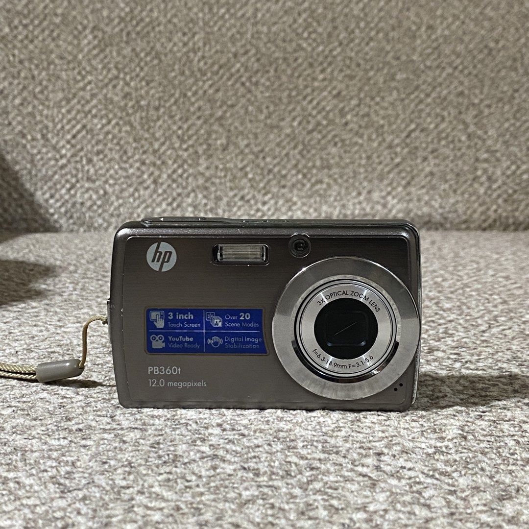 HP PB360t Digital Camera (Digicam) TOUCHSCREEN in SILVER with ACCESSORIES ! (Category: Cameras) located in Manila. Submitted by hailtothefilm (Listing ID 1470107850, Image 2). Description: 📸 HP PB360t Digital Camera (Digicam) TOUCHSCREEN in SILVER with ACCESSORIES ! for Sale 3,599! DESCRIPTION: ✅in PRISTINE body condition. ✅ crisp outputs ✅Tested, fully functioning. ✅ Fully functioning LCD, all sides ✅ 12.0 megapixel ✅ 3.0 inches screen ✅ One of
