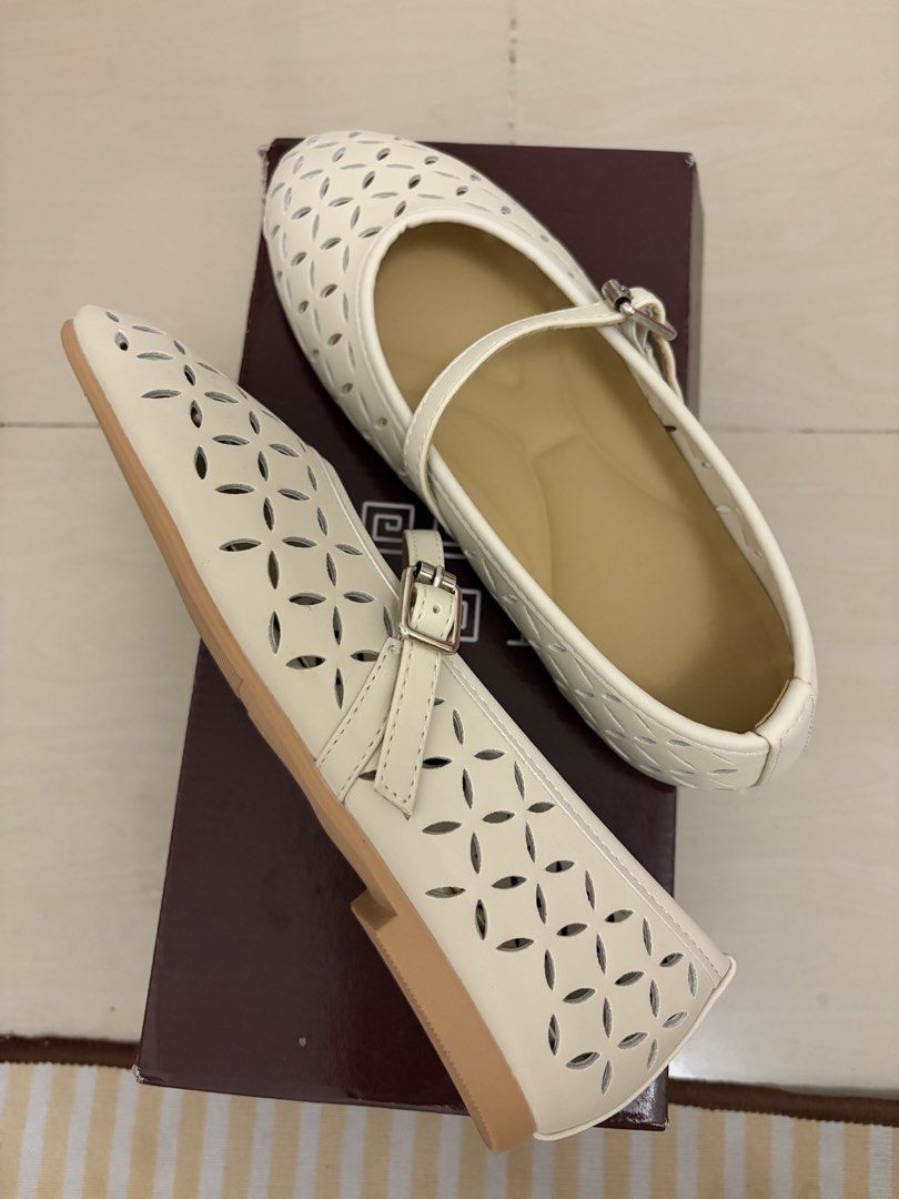 Hue Lily Creme Mary Jane Flats (Category: Flats & Sandals) located in Bacoor. Submitted by _camilleeee_ (Listing ID 1470084550, Image 3). Description: - Brand: Hue (Lily Creme flats) - Never Worn - Color & Material: Cream premium vegan leather with laser-cut floral design - Style: Mary Jane with adjustable buckle strap - Comfort: Ergonomic soft cushion insole for all-day wear - Condition: Brand new, never worn, with original box and packaging - P