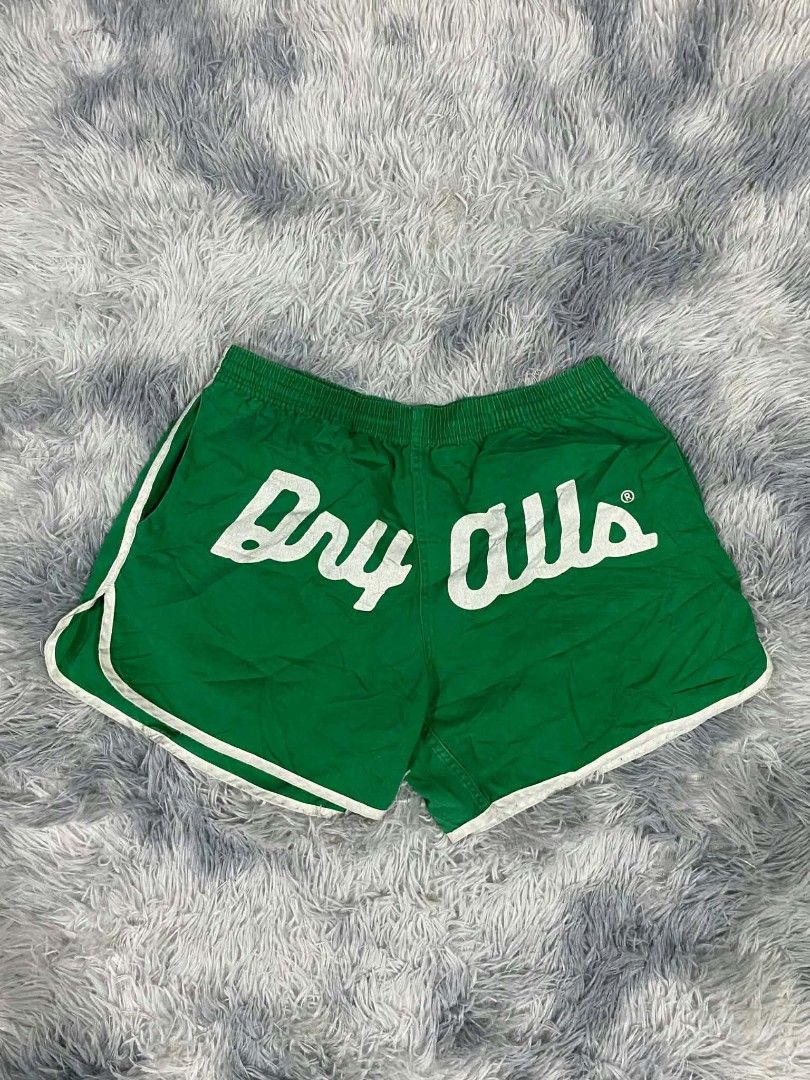 Human Made Green Dry Alls Shorts (Category: Shorts) located in Manila. Submitted by gemfinds650 (Listing ID 1470102592, Image 2). Description: - Brand: Human Made - Color: Green with white piping - Design: 'Dry Alls' print on front, red heart logo patch on the single back pocket - Waistband: Elastic with internal drawstring for an adjustable fit - Details: Inner brand tag included - Condition: Brand new / Excellent quality .
