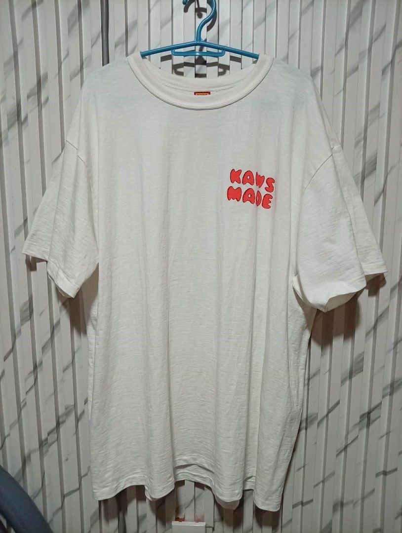 Human Made X Kaws Made Graphic Shirt (Category: Tshirts & Polo Shirts ) located in Barotac Nuevo. Submitted by john.pritz (Listing ID 1470056959, Image 2). Description: Human Made X kaws Made Graphic Shirt Like new condi no issue Size X-Large on tag Width 23 to 24 Length 30.