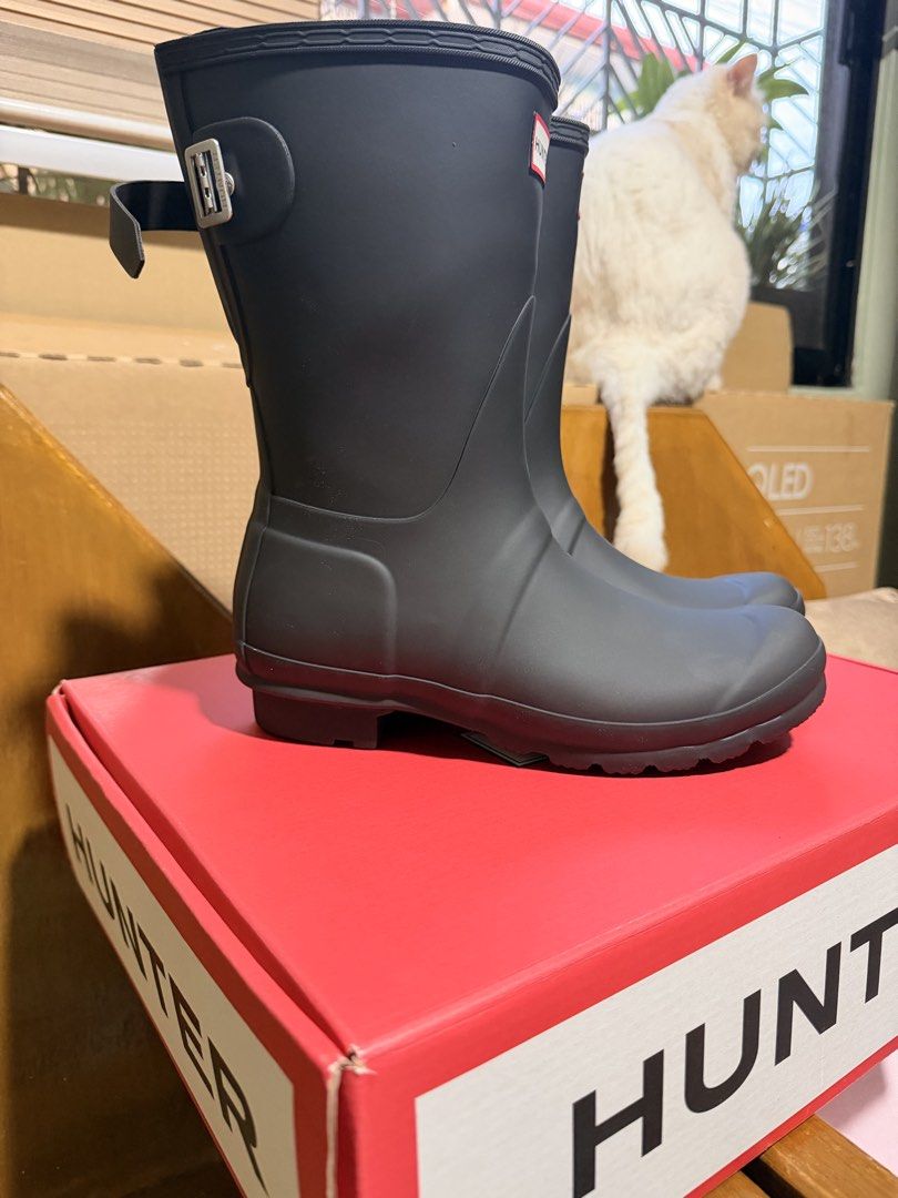 Hunter Original Short Rain Boots Black Adjustable Back (Category: Boots) located in Makati City. Submitted by gllydeclutters1997 (Listing ID 1470040257, Image 2). Description: - Brand: Hunter - Style: Short rain boots with adjustable side buckle - Color: Classic matte black - Details: Signature red box logo on front - Inclusion: Original red Hunter shoebox - Condition: Great for rainy days or outdoor events.