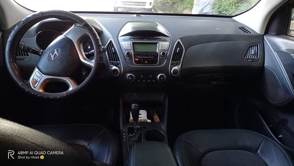 Hyundai Tucson 2.0 GLS (A) (Category: Used Cars) located in Manila. Submitted by coconutwaterman (Listing ID 1469982347, Image 3). Description: 2010 HYUNDAI TUCSON THETA II GLS 4x2 • Automatic | 2.0 Gas Engine • 37,768 KM as of Oct 24, 2026 • 2nd owner (1st owner is family) • All-original interior & exterior • No major accident • Used ~1x/week • LTO registered until Jan 2027 • Major service at Hyundai Casa • RFID & complete legal papers • Plate e