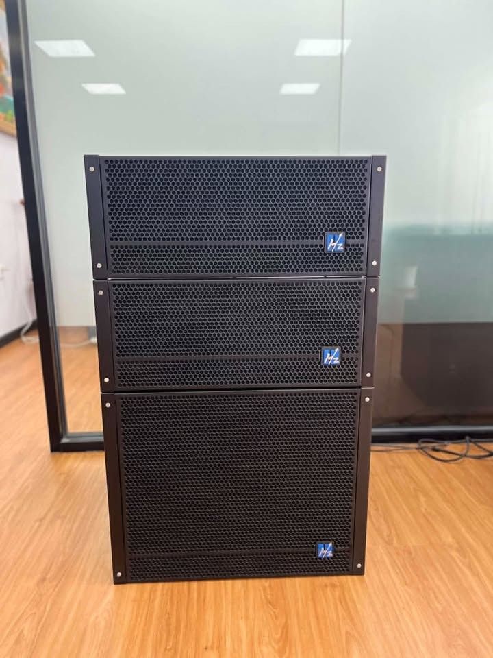 HZ Audio LD Series Line Array Speaker System (Category: Soundbars, Speakers & Amplifiers) located in Paranaque City. Submitted by digitalconcept.corp (Listing ID 1469960313, Image 2). Description: - Brand/Model: HZ Audio LD Series Professional Speaker Stack - Configuration: Line array modules with matching bottom subwoofer - Build: Sturdy black textured enclosures with protective metal grilles - Hardware: Integrated rigging hardware with locking 