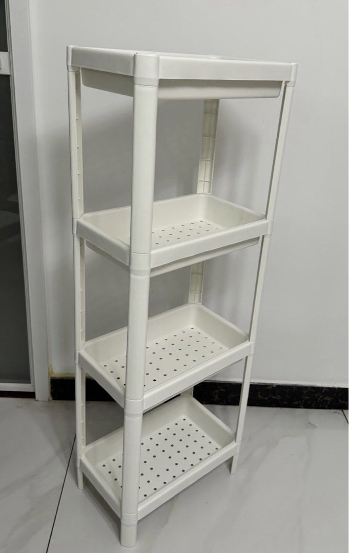 IKEA 4-Tier White Plastic Storage Rack Shelf (Category: Shelves, Cabinets & Racks) located in Makati City. Submitted by lovejuju72 (Listing ID 1470083895, Image 1). Description: - 4-tier white plastic storage rack for easy organization - Perforated baskets keep items drained and dry - Lightweight frame ideal for kitchens, bathrooms, and tight corners - Sturdy legs provide reliable support on flat floors - Perfect for daily essentials.