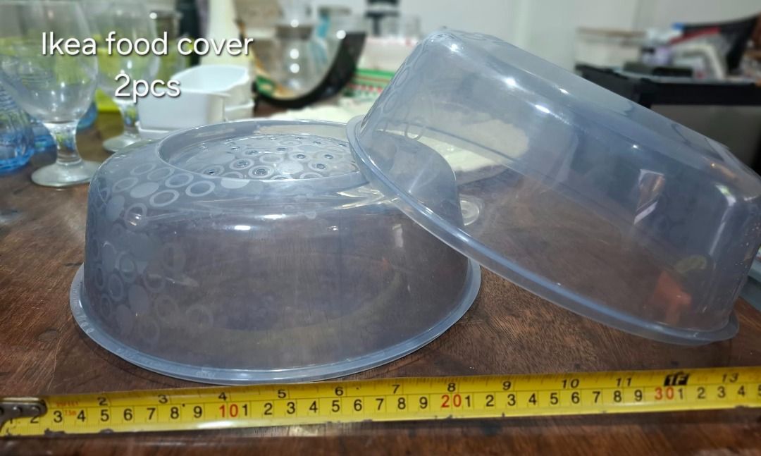 IKEA Food Covers Set of 2 (Category: Other Kitchenware & Tableware) located in Pasig City. Submitted by dripcounty (Listing ID 1470026484, Image 1). Description: IKEA Food Covers Set of 2 ₱100 Bought in the Philippines Condition: Good / preloved Two translucent IKEA dome food covers with ventilation holes. Surface scratches visible. Price is for both covers. Detail photo shows the same set. Actual item shown in photos. Delivery fee shouldered by 