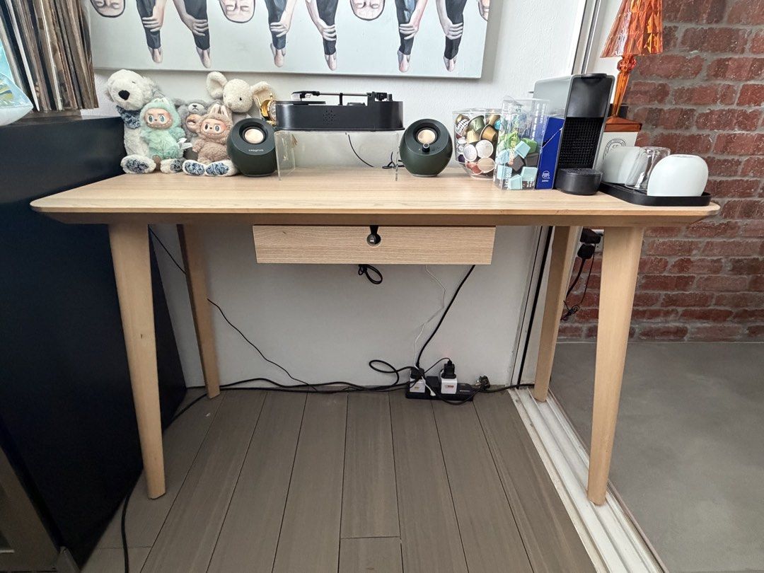 IKEA study table (Category: Tables & Sets) located in Singapore. Submitted by daddyweng (Listing ID 1469981296, Image 1). Description: 117 x 45 x 75 cm Compact study table Light brown wooden Comes with drawer Sturdy and not shaky .