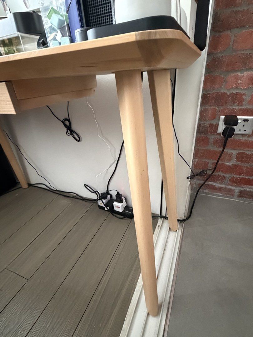 IKEA study table (Category: Tables & Sets) located in Singapore. Submitted by daddyweng (Listing ID 1469981296, Image 3). Description: 117 x 45 x 75 cm Compact study table Light brown wooden Comes with drawer Sturdy and not shaky .