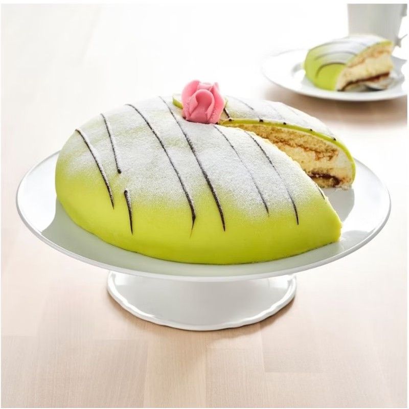 IKEA UPPLAGA Cake Stand with Base 29 cm (Category: Bakeware) located in Makati City. Submitted by goldenbird.001 (Listing ID 1470022313, Image 2). Description: - Authentic IKEA UPPLAGA cake stand - Diameter: 29 cm - Material: Premium white ceramic with a lovely scalloped edge base - Designer: Ebba Strandmark - Condition: Brand new in original packaging/box with barcode - Perfect for displaying cakes, pastries, and desserts for any occasion.
