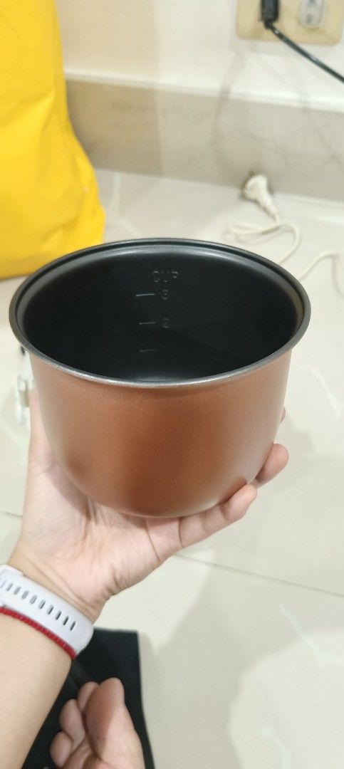 Imarflex Portable Mini Rice Cooker 3 Cups (Category: Cookers) located in Manila. Submitted by cleverdog_a9b18a (Listing ID 1470071186, Image 3). Description: - Brand: Imarflex Portable Mini Rice Cooker - Capacity: 3-cup capacity with inner cup measurements - Pot: Non-stick Teflex inner pot - Power: 200W energy-saving rating - Features: Simple cook and warm switch with indicator lights - Cleaning: Removable inner lid for easy washing - Ideal for: 