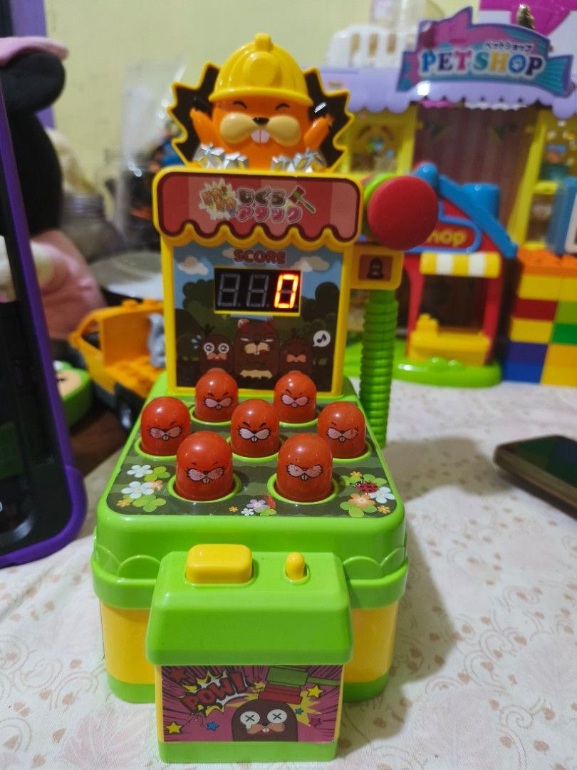Interactive Whack-A-Mole Toy with Electronic Score Display (Category: Interactive Toys) located in Caloocan City. Submitted by mckysprelove (Listing ID 1469965121, Image 1). Description: - Interactive popup mole game for kids - Built-in digital score display on the front panel - Includes a red toy hammer attached to the side - Colorful green and yellow plastic body with stickers - Battery-operated and great for hand-eye coordination - Clean and r
