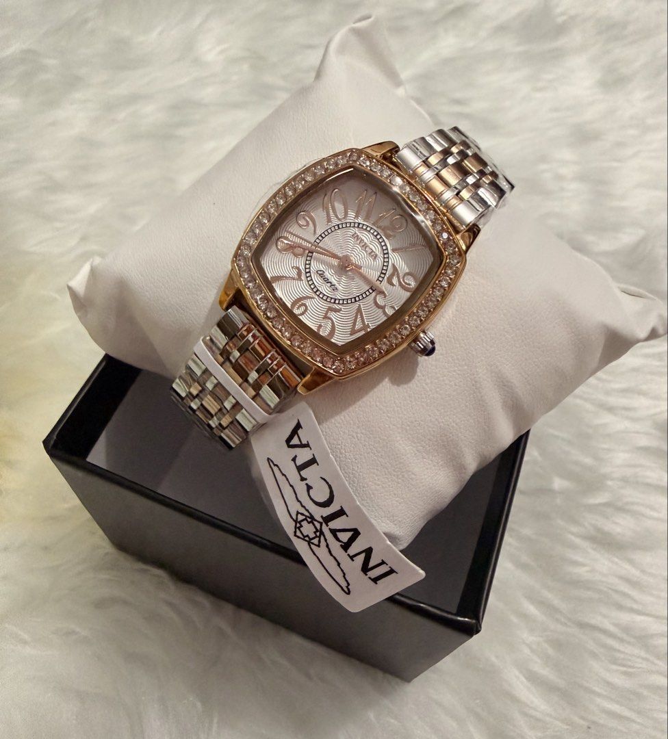 Invicta Wildflower Two Tone Watch (Category: Women's Watches) located in Manila. Submitted by shobeybe08 (Listing ID 1469953041, Image 2). Description: INVICTA WILDFLOWER TWO TONE WATCH Brandnew 💯AUTHENTIC Bought in US 🇺🇸 Money back guarantee Onhand and ready to ship Open for layaway Lalamove ready/LBC/J&T Loc: MANILA DM for inquiries 🫶 - Brand new with tag attached - Quartz movement - Square bezel covered in sparkling crystals - Two-tone ros