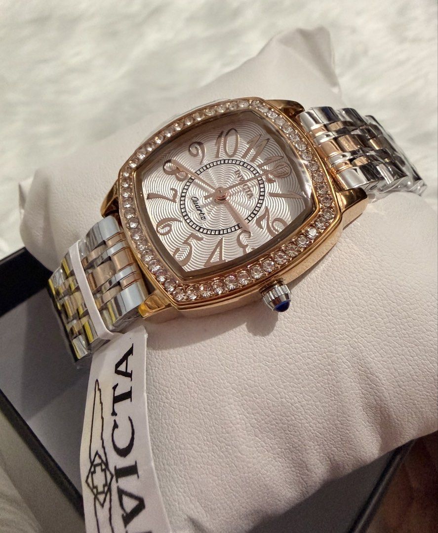 Invicta Wildflower Two Tone Watch (Category: Women's Watches) located in Manila. Submitted by shobeybe08 (Listing ID 1469953041, Image 1). Description: INVICTA WILDFLOWER TWO TONE WATCH Brandnew 💯AUTHENTIC Bought in US 🇺🇸 Money back guarantee Onhand and ready to ship Open for layaway Lalamove ready/LBC/J&T Loc: MANILA DM for inquiries 🫶 - Brand new with tag attached - Quartz movement - Square bezel covered in sparkling crystals - Two-tone ros