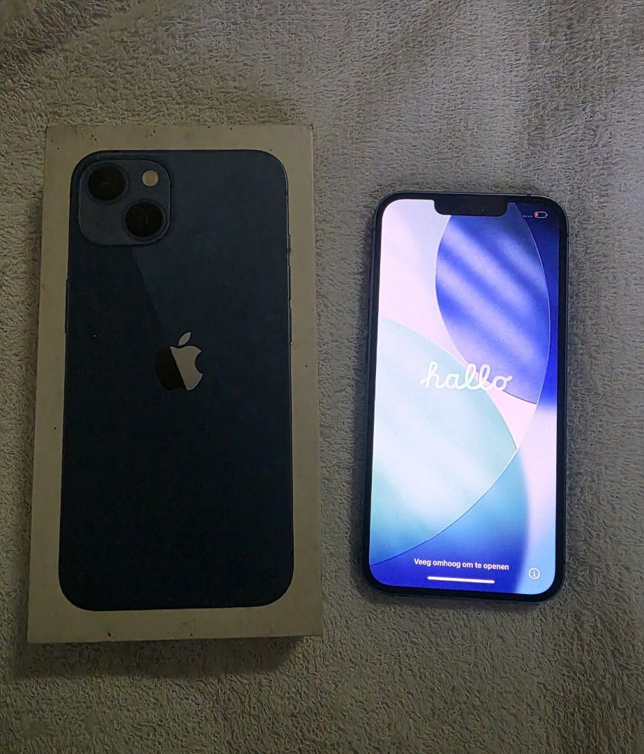 Iphone 12 128gb and 13 256gb (Category: iPhone 13 Series) located in Manila. Submitted by jmdizon1826514 (Listing ID 1469987839, Image 3). Description: Iphone 12 128gb dark blue Openline All parts original✅️ Never been repair✅️ Paint chips galing sa mga case / small dent Unit and rep. Box True tone ✅️ Face id ✅️ batt 72% Iphone 13 256gb blue Openline All parts original ✅️ Never been repair✅️ Paint chips galing sa mga case / dent onti Original box