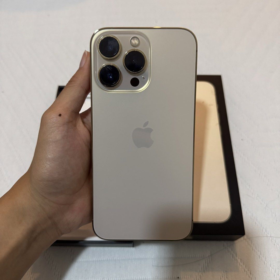 Iphone 13 Pro 128gb (Category: iPhone 13 Series) located in Cainta. Submitted by chambieee (Listing ID 1470068640, Image 3). Description: NO LAST PRICE ANYMORE :) Personal used 😊 128gb Color: Gold Openline (no sim restrictions) Still presentable 70% battery health (original) Display: Genuine apple part (wayback 2024) (apple service center) Overall working and usable :)) With original box and case only Rfs: Upgrade Transparent with the issues so 